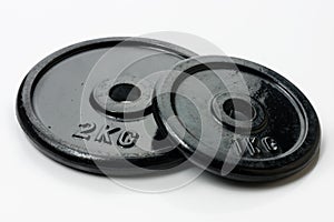 Weight plates on white background. Sporting equipment