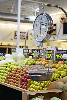 A weight scale in the produce area