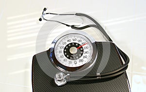 Weight scale with stethoscope