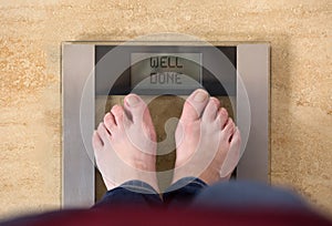 Weight Scale Woman is Standing on Says Well Done