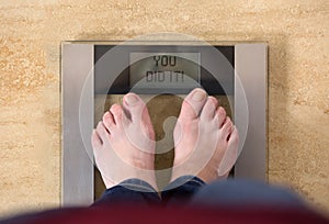 Weight Scale Woman is Standing on Says You Did It