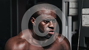 Weight training African bodybuilder portrait