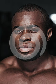 Weight training African bodybuilder portrait