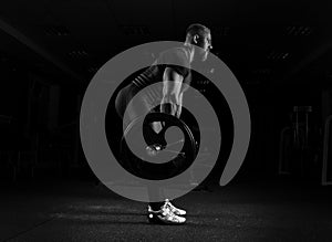 The weightlifter performs an exercise called deadlift.