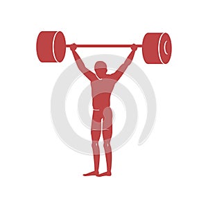 Weightlifter raises heavy barbell. Very hard sport for professional athletes.