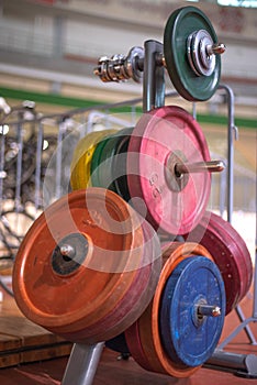 Weightlifting barbell in the gym