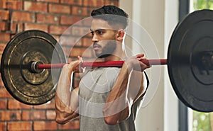 Weightlifting, workout and man with barbell in gym for exercise, bodybuilder training and fitness. Sports, muscles and