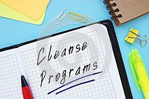 Weightloss concept about Cleanse Programs with sign on the page
