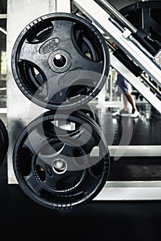 Weights Lifting Rack in Club Fitness Gym., Bodybuilder Equipment Barbell for Shoulders Muscle Exercising and Workout Machine