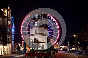 Weihnachtsmarkt, Christmas Market and ferris wheel at Burgplatz square in DÃ¼sseldorf, Germany.