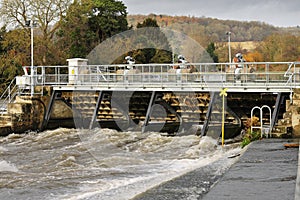 Weir and sluice gate on the River Thames photo
