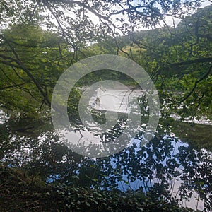 Weir waterfall with reflections of the sky