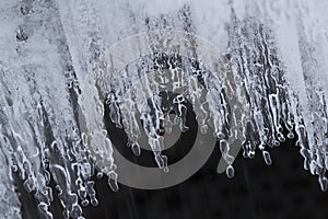 Weird Icicles forming over Icelandic geothermal stream in winter