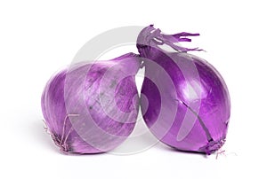 Weird purple onions on white background