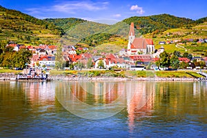 Weissenkirchen, Austria. Wachau Valley on Danube River, autumn colored leaves and vineyards on a sunny day