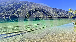 Weissensee - Panoramic view of alpine landscape seen from east bank of lake Weissensee in Carinthia, Austria photo