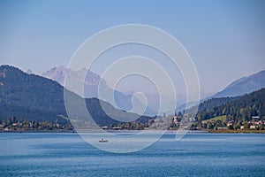 Weissensee - Scenic view of east bank of alpine lake Weissensee in Gailtal Alps, Carinthia, Austria photo