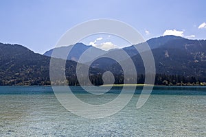 Weissensee - Scenic view of east bank of alpine lake Weissensee in Gailtal Alps, Carinthia, Austria photo