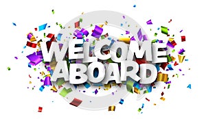 Welcome aboard sign over colorful cut out foil ribbon confetti background