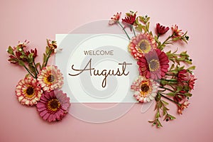 Welcome August typography text with LED cotton ball on pink background
