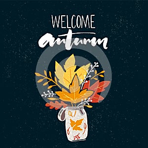 Welcome autumn banner with brush calligraphy and drawing of posy of the golden leaves. Vector fall design with