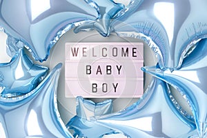 Welcome baby boy. Lightbox with letters and inflatable foil balloons.