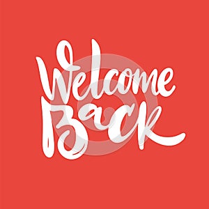 Welcome Back phrase vector lettering. Isolated on orange photo
