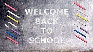 Welcome back to school writing on chalkboard. Design illustration
