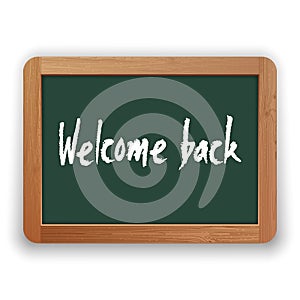 Vector Welcome Back Phrase on Green Blackboard photo