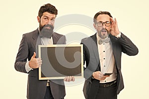 Welcome on board. bearded men hold advertisement blackboard. partners celebrate start up business isolated on white