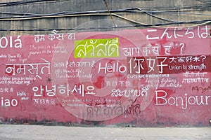 Welcome board with greeting on foreign languages
