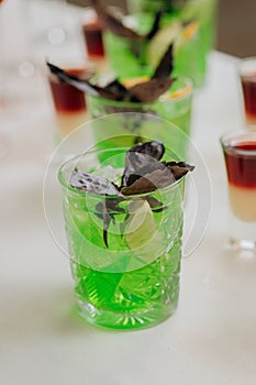 Welcome drink with cocktail glasses and drinks at an event. Alcoholic beverages at a wedding