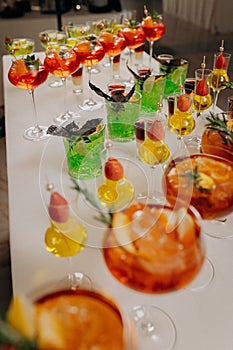 Welcome drink with cocktail glasses and drinks at an event. Alcoholic beverages at a wedding