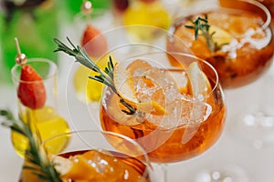 Welcome drink with cocktail glasses and drinks at an event. Alcoholic beverages at a wedding