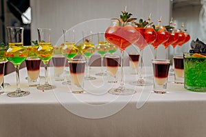 Welcome drink with cocktail glasses and drinks at an event. Alcoholic beverages at a wedding