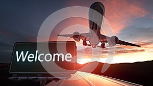 Welcome Green Road Sign and Airplane Above with Dramatic Blue Sky and Clouds