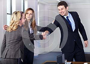 Welcome handshake before business meeting