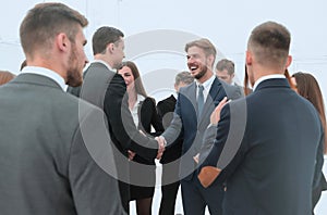 welcome and handshake of business partners in the office.