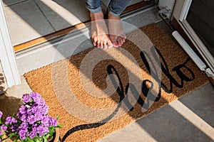 Welcome mat in front of new home