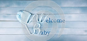 Welcome newborn baby boy. Boy`s hat. Baby shower, birthday, invitation or greeting card idea.