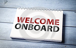 Welcome onboard and support symbol. Concept words Welcome onboard on white note