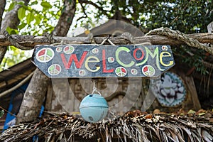 Welcome sign in front of the beach cafe in island Koh Phangan, Thailand