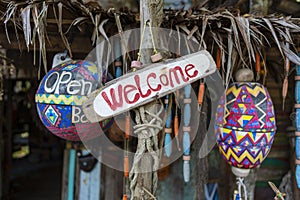 Welcome sign in front of the beach cafe in island Koh Phangan, Thailand