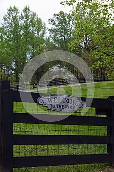 Welcome sign at the gate at the farm in the country.