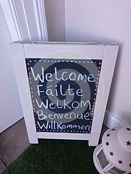 Welcome sign in 5 languages