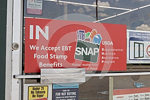 We Welcome SNAP Benefits sign. SNAP and Food Stamps provide nutrition benefits to assist disadvantaged families