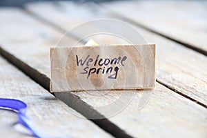 Welcome Spring. Inscription on the cubes.