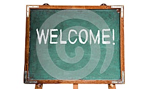 Welcome! text message in white chalk written on a school green old grungy vintage wooden chalkboard or blackboard