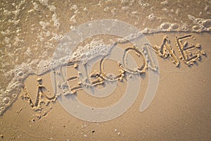 Welcome, texture on the beach sand.