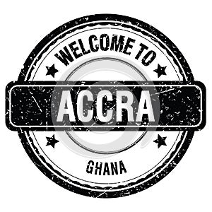 WELCOME TO ACCRA - GHANA, words written on black stamp